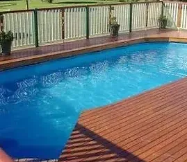 Swimming pool set into a landscaped outdoor area