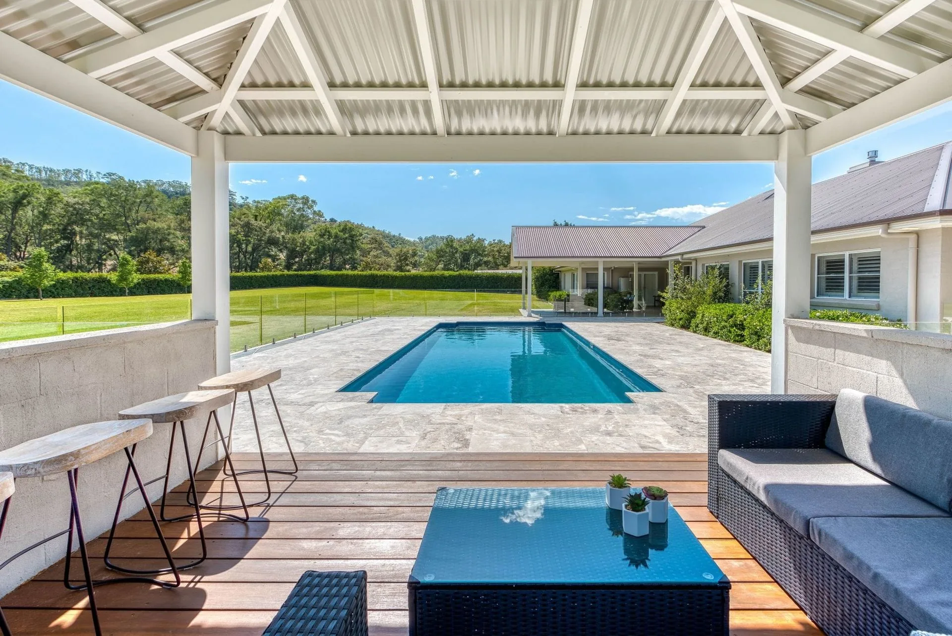 Family swimming pool with outdoor entertaining area