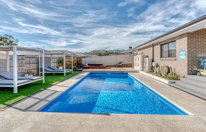 Entertainer Masterbuilt pool beside an outdoor entertaining area